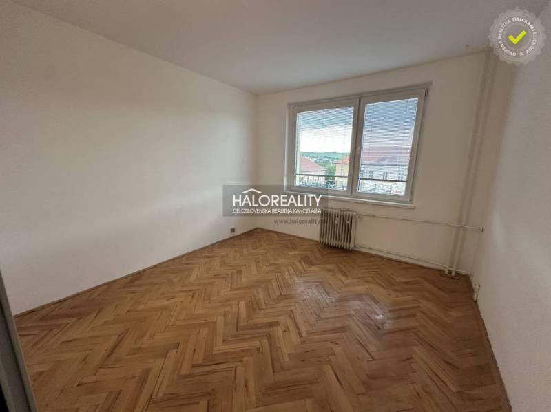Entrance hallway in a 3-room apartment with doors and linoleum flooring.