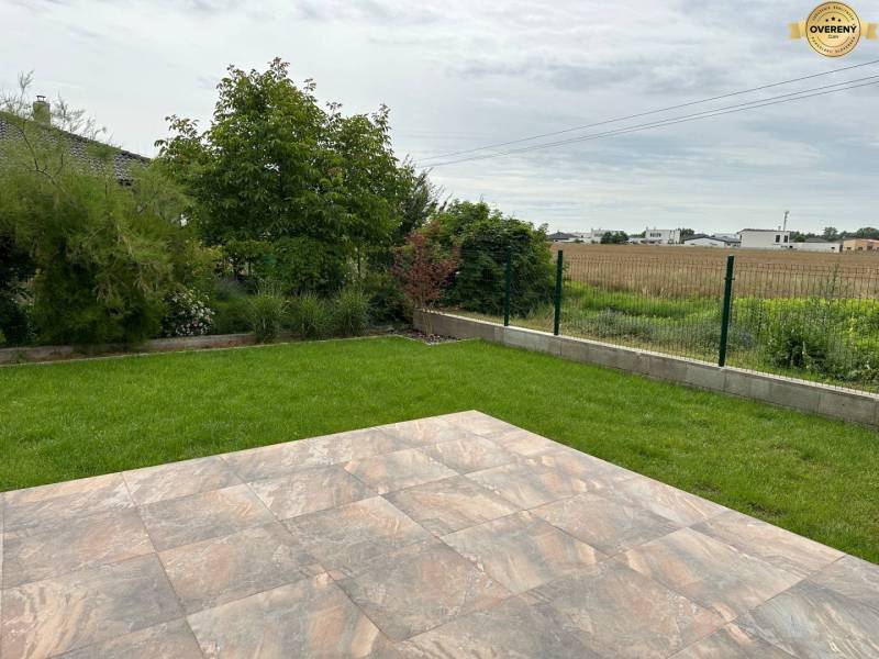 View from the family house on Nevädzová Street in Kalinkovo, terrace with lawn and view.