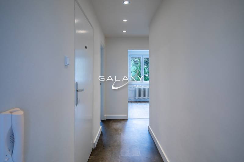 Hallway with lights and a view of the room on Boriny Street, 3-room apartment.