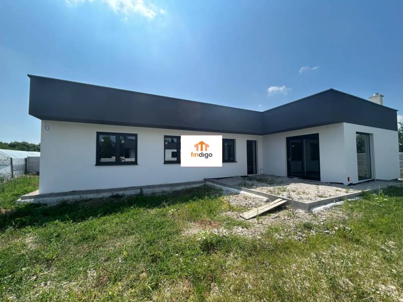 A family house in Žihárec with a garden and modern architectural elements.