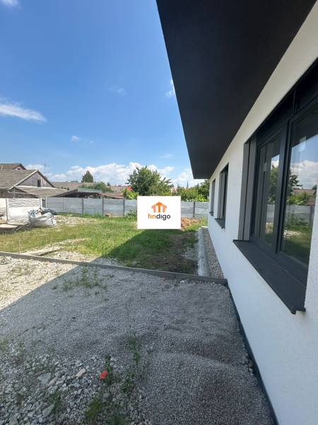 A family house in Žihárec with a view of the yard and adjacent properties.