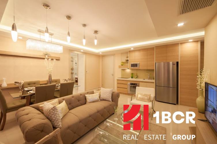 3-room apartment with a kitchen, dining room, and living room in soft shades.