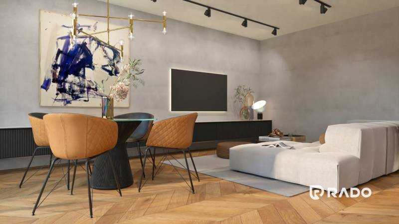 Living room in a two-room apartment with a comfortable armchair and artistic decoration.
