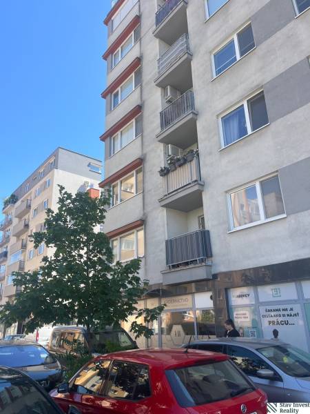 Apartment building on Lichnerova Street in Senec with commercial spaces and a parking lot.