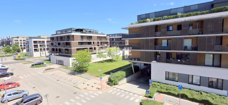 A view of parking and apartment buildings in Petržalka on Žltá Street, Bratislava.
