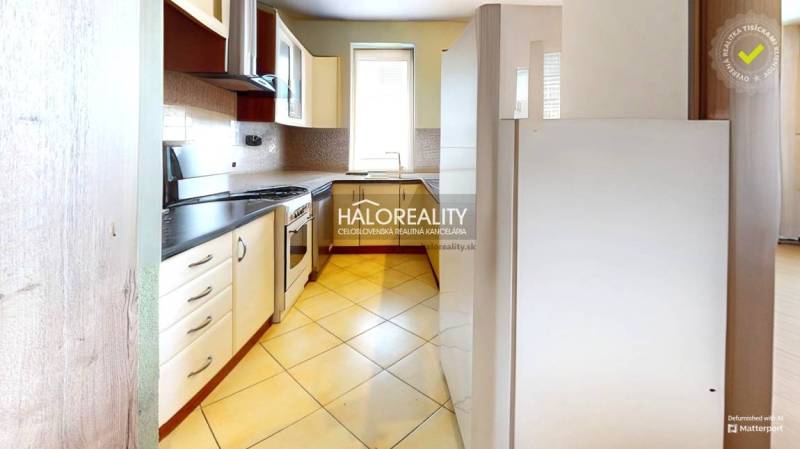 A kitchen in a family house with equipment, gas stove, lighting atmosphere.