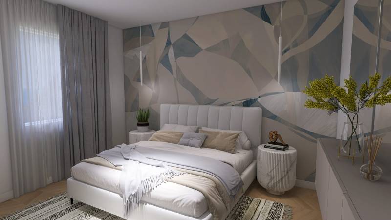 A bedroom in a 4-room apartment with abstract wallpaper, a bed, and decorations.