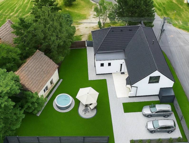 A top view of a family house on Stara Gala in Holice with a pool and terrace.