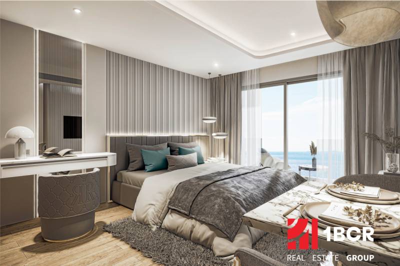 A bedroom with elegant furniture and a sea view, Apartment construction.