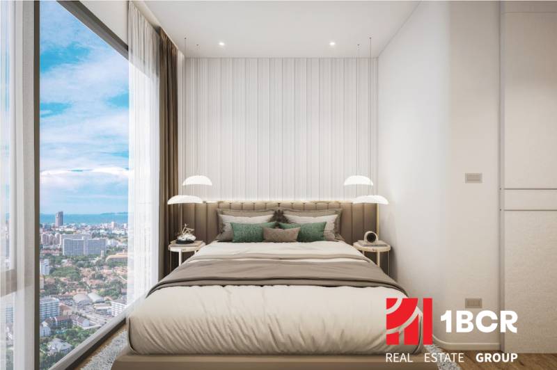 Stylish bedroom in a 3-room apartment with a view of the city.