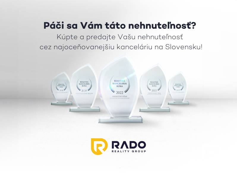 The image shows the awards of the real estate agency RADO Real Group on Žabotova Street.
