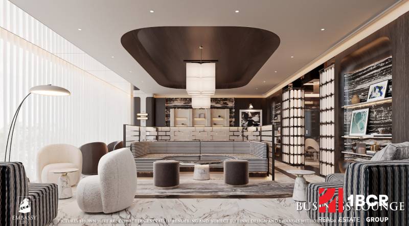 Spacious living area with armchairs, a floor lamp, and wood-patterned flooring.