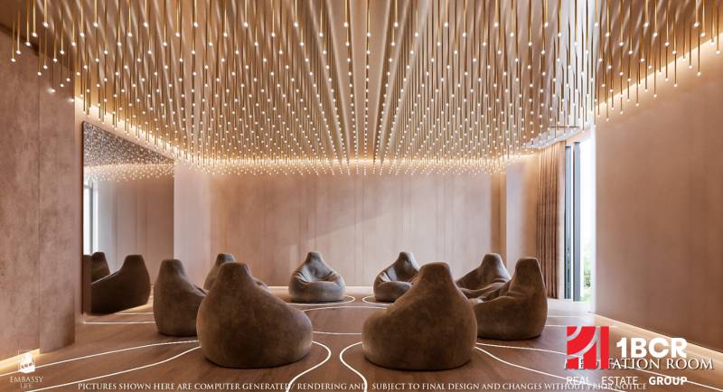 A luxurious room with comfortable seating and enchanting lighting within the construction of apartments.