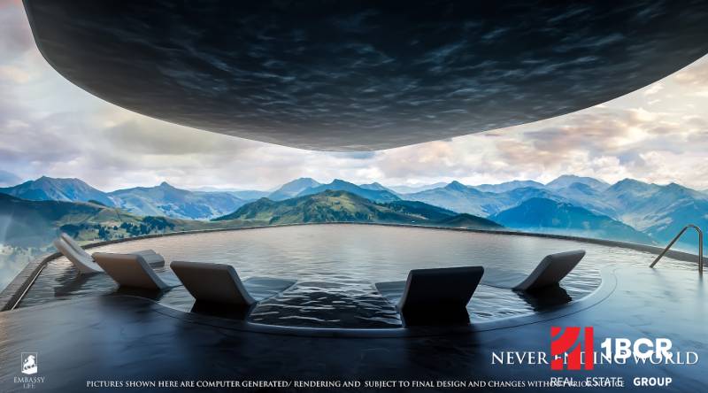Apartment construction: View of the pool and mountain panorama with sun loungers.