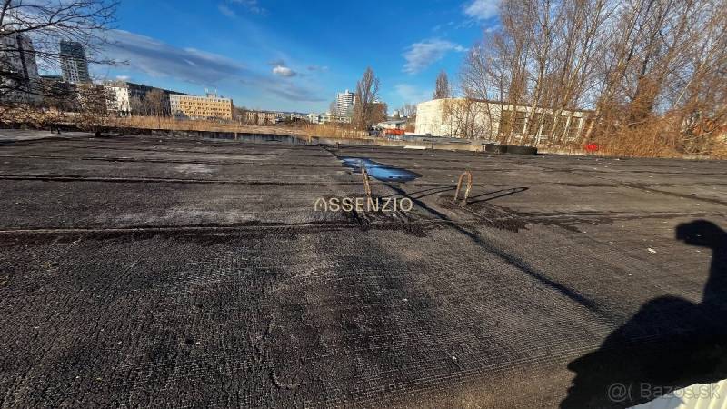 A rooftop view of buildings from garages in Bratislava - Ružinov on Prístavná Street in winter.
