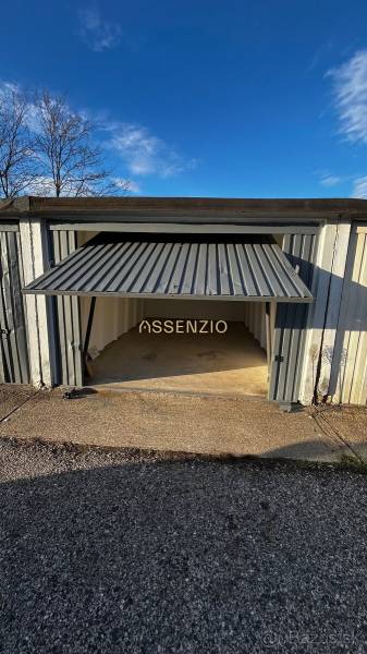 An open garage on Prístavná Street in Bratislava - Ružinov without a parked vehicle.
