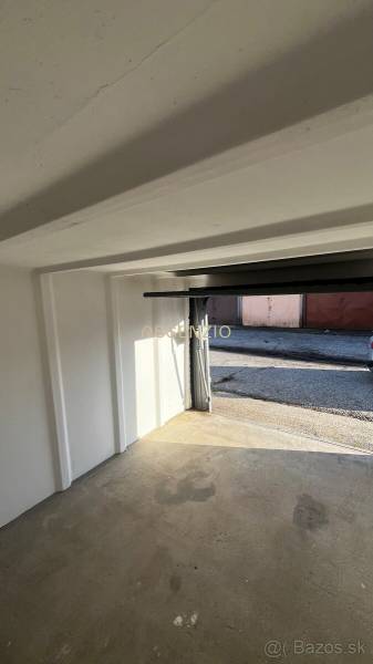 Spacious garage with raised doors on Prístavná Street in Bratislava - Ružinov.