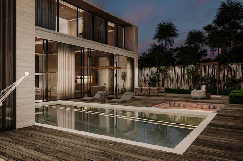 A family house in Zanzibar North with a pool, terrace, and glass walls.