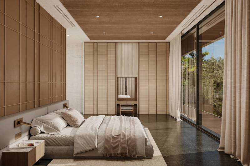 Bedroom in a family house with a large window, wooden panels, and a bed.