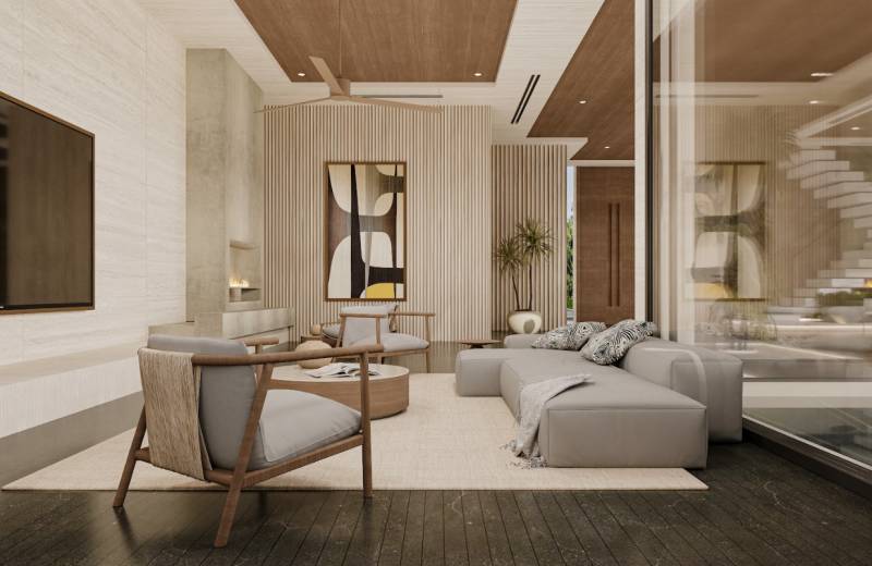 A stylish living space in a family house with comfortable furniture and wooden elements.