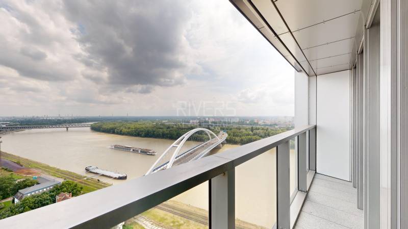 View from the balcony of a 4-room apartment of the Danube and the Bratislava bridge in Bratislava.