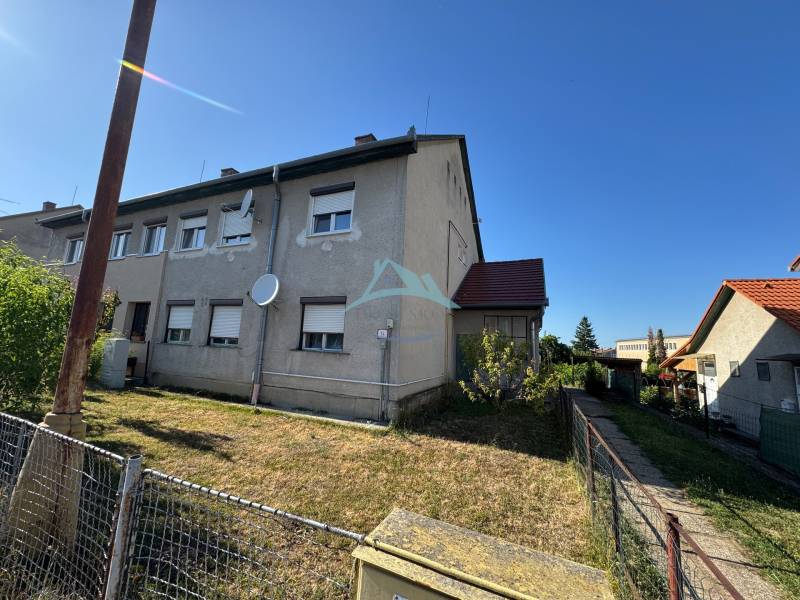 Exterior of a 3-room apartment on Obrancov Mieru Street in Šahy, with a satellite and lawn.