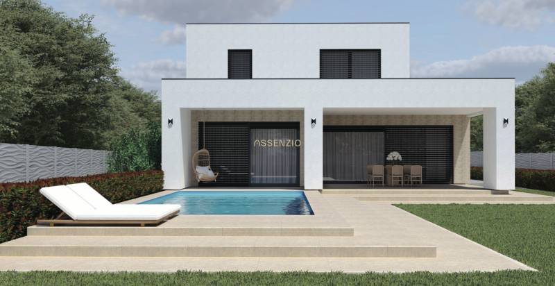 A family house in Opoj with a swimming pool, lounger, and terrace surrounded by greenery.