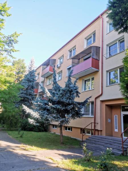 An apartment building on Hviezdoslavova Street in Zlaté Moravce with three floors and balconies.