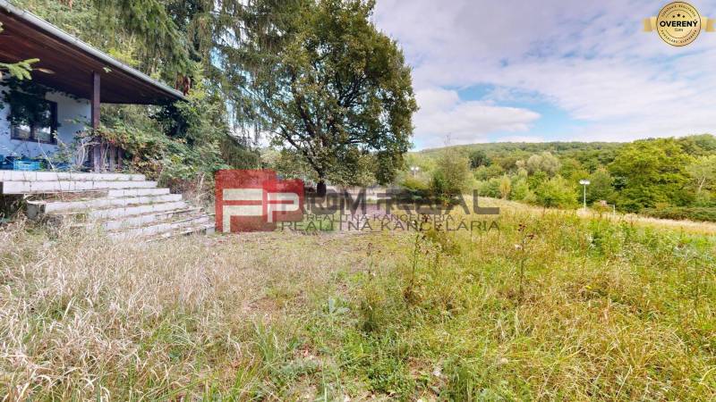 A cottage surrounded by greenery and trees on plots - living in Pezinok.