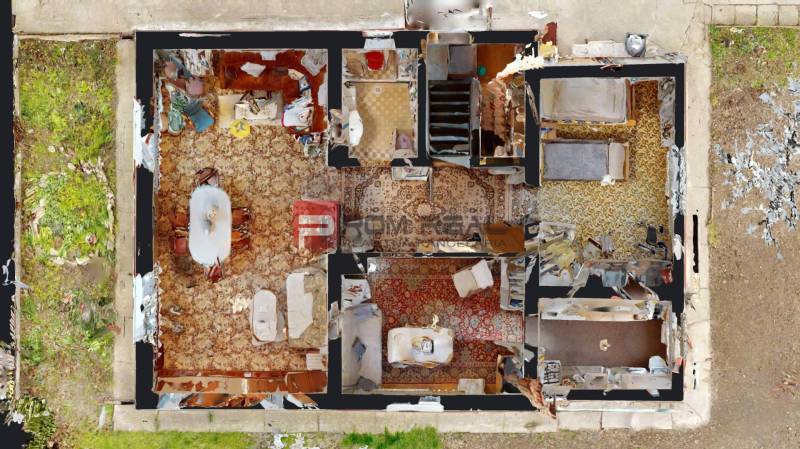 A view of the layout of the family house rooms, including the living room, bedroom, and kitchen.
