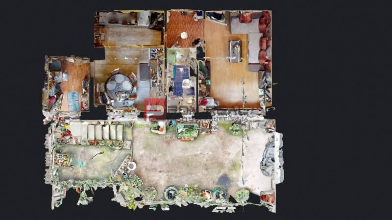 The floor plan shows the layout of a two-room apartment with an adjacent outdoor space.