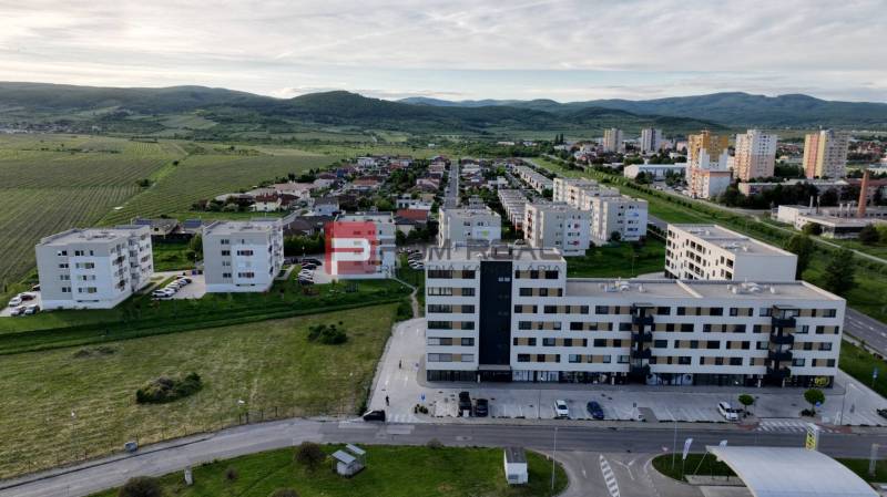 Commercial premises on Obchodná Street in Pezinok, surrounded by greenery and residential areas.