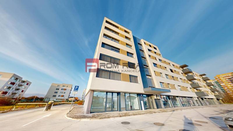 Commercial premises in Pezinok on Obchodná Street in a modern building with glass displays.