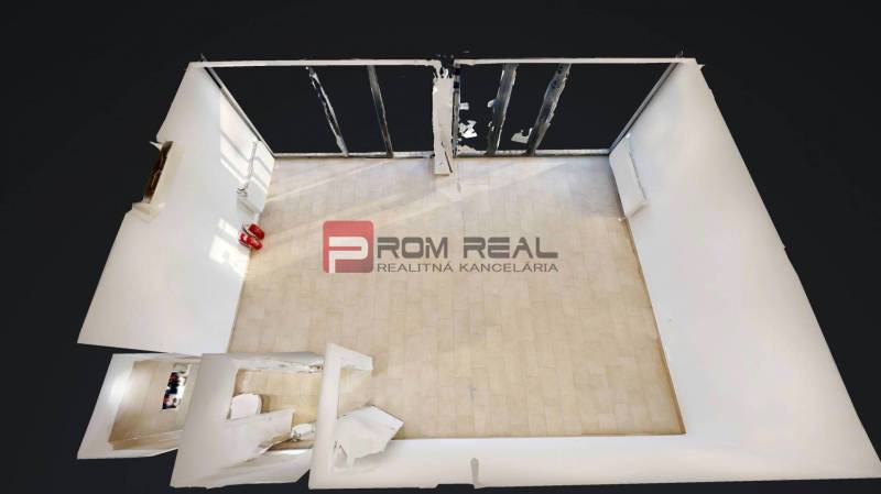 Commercial spaces with large windows and light tiles.
