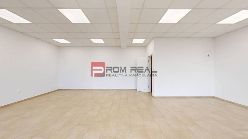 Empty commercial spaces with white walls and flooring, suitable for customization.
