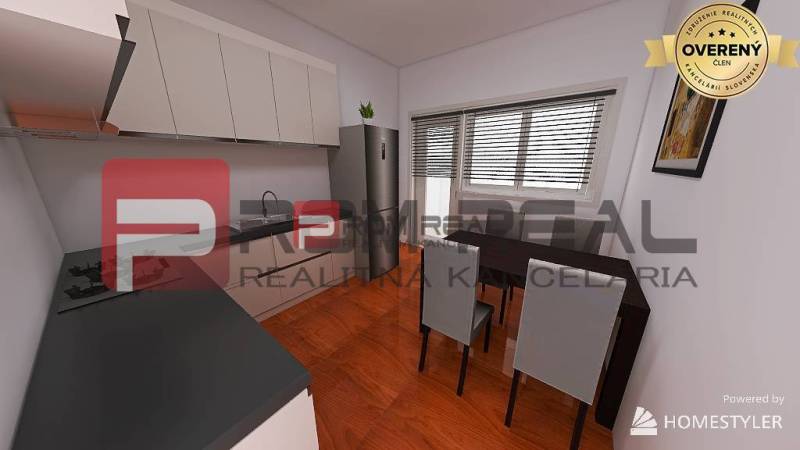 A kitchen in a 3-room apartment with a dining table and a modern kitchen unit.