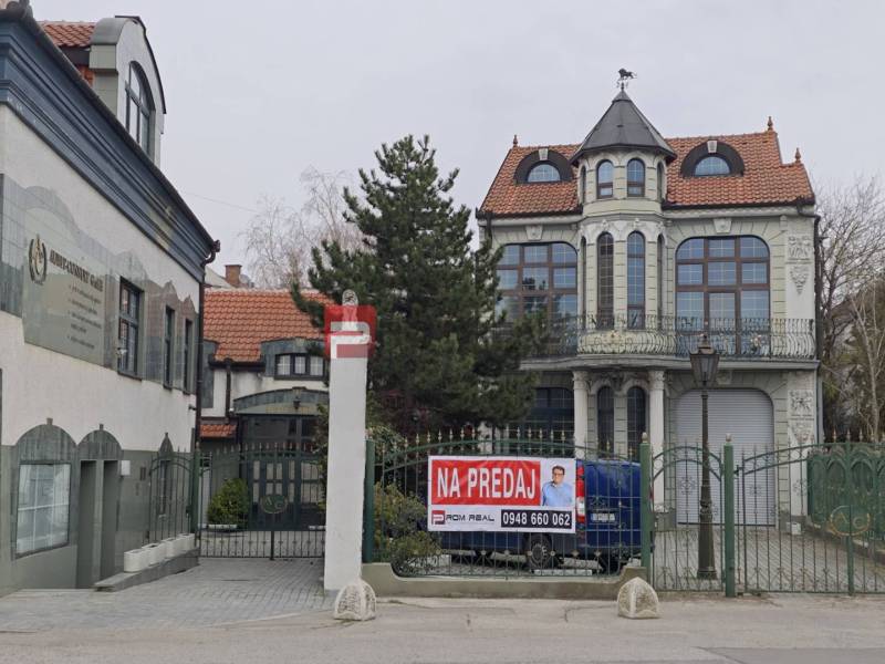 Building on Ľ. Podjavorinská Street in an exhibition style with the sign 