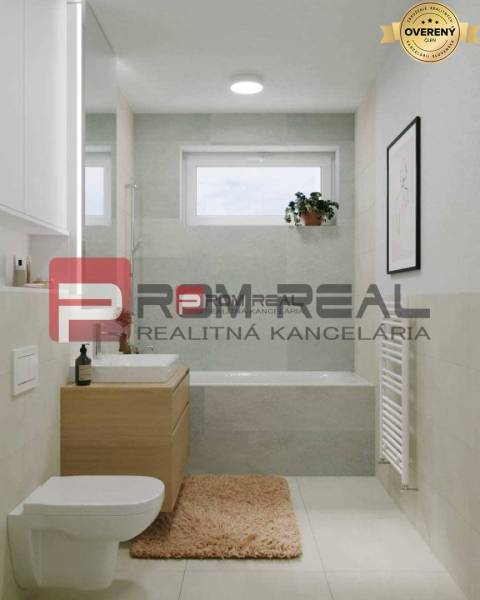 Bathroom in a 2-room apartment on Limbašská Street, modern tiles, bathtub, sink, toilet.