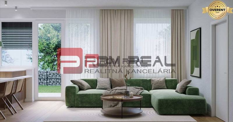 The living room in the three-room apartment has a green sofa and a wooden table, Limbašská cesta.