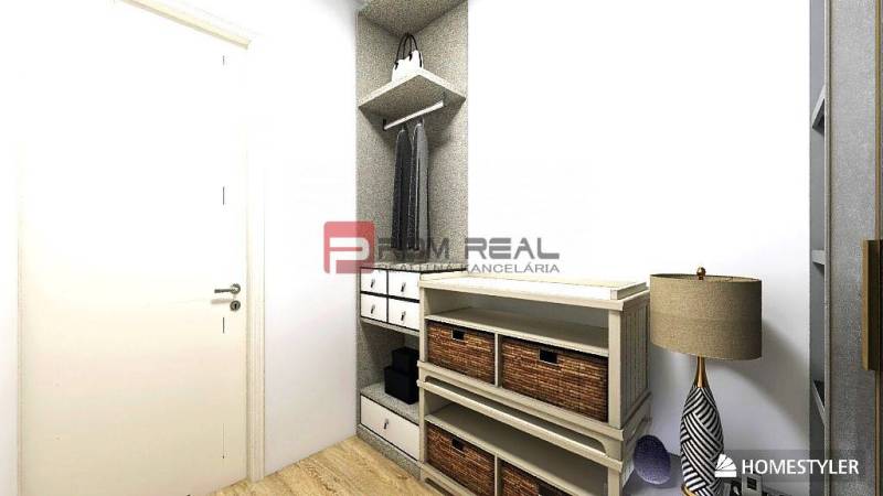 Hallway in a studio apartment with shelves, baskets, and a floor lamp.