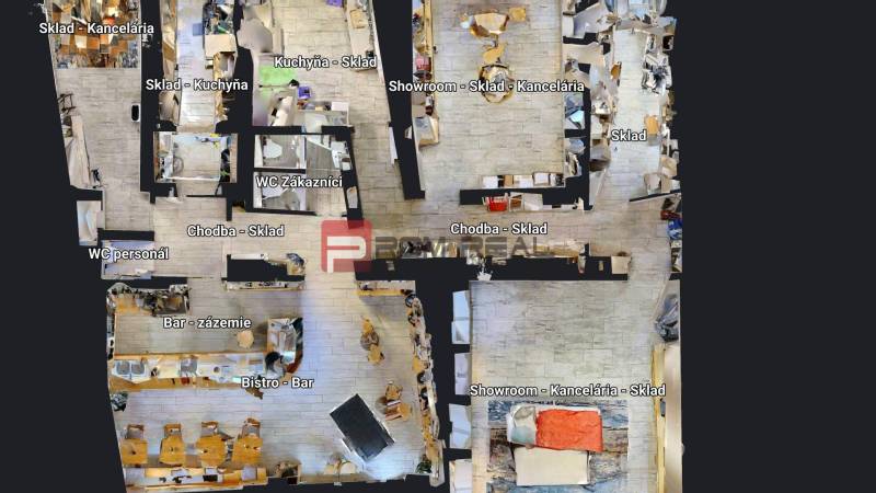 Floor plan of commercial spaces with kitchen, bistro, storage rooms, and showroom.
