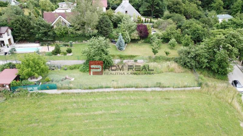 Aerial view of plots - housing on Na Tálkoch street in Marianka. Gardens and greenery.