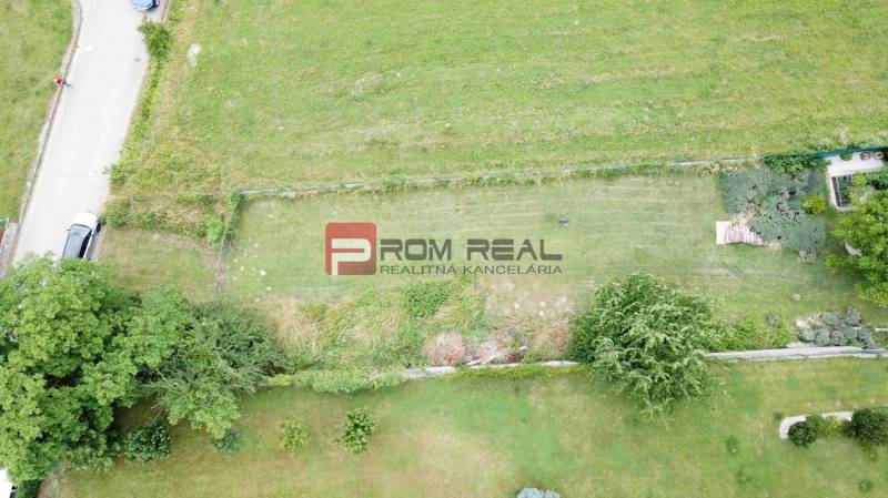 Aerial view of residential plots in Marianka, Na Tálkoch, surrounded by greenery.