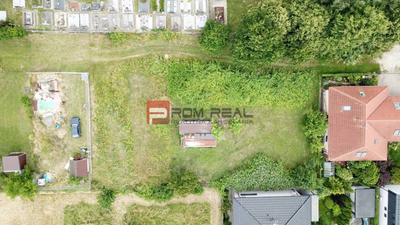 Aerial view of plots - housing in Marianka on Na Tálkoch street, between houses.