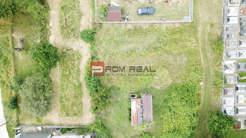 Aerial view of an unmaintained residential plot in Marianka on Na Tálkoch Street.