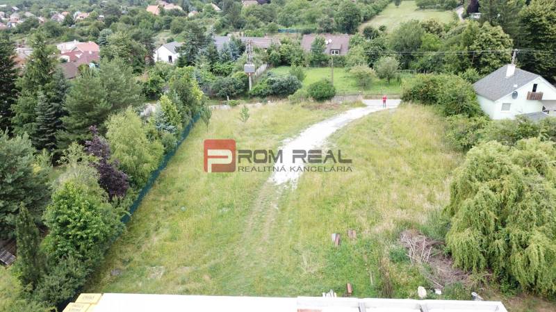 Location of residential plots on Štúrova Street in Marianka, surrounded by greenery and houses.