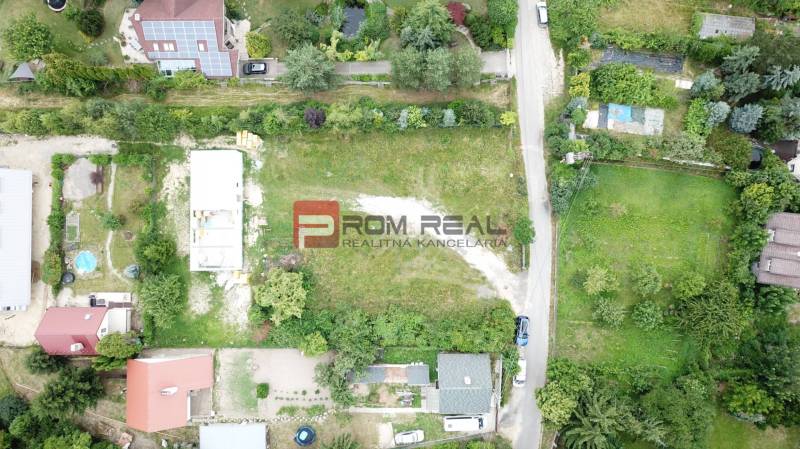 Aerial view of green residential plots on Štúrova Street in Marianka.