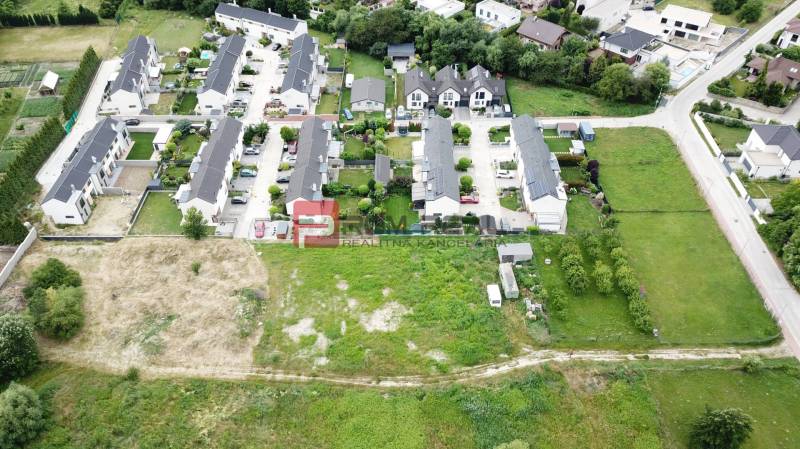 Aerial view of a residential area and plots - housing in Marianka on Na Ovsisku.