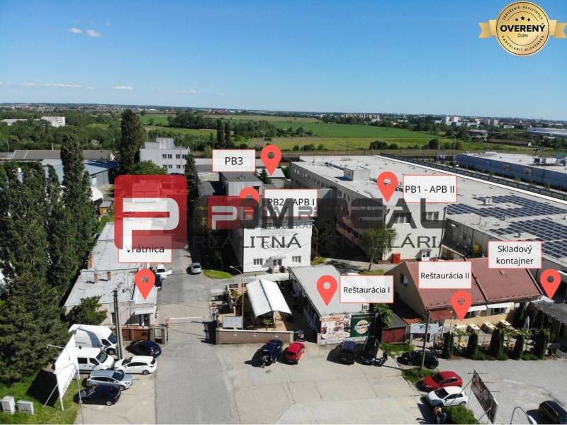 Industrial area on Púchovská Street in Bratislava III with restaurants and warehouses.