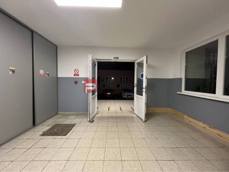 Entrance hallway inside warehouses and halls with exit to the parking lot.